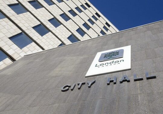 A photo of the City Hall sign